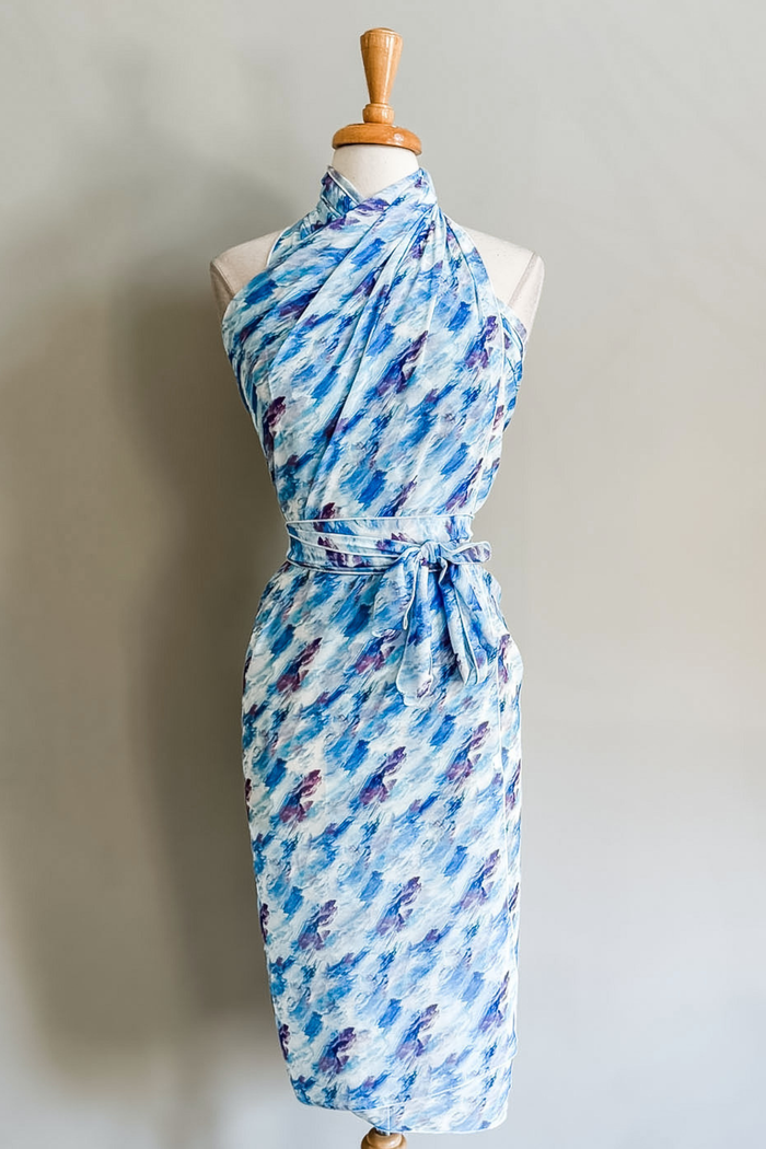 Diane Kroe Butterfly Wrap in Watercolor Wave print styled as a versatile wrap dress for travel and resort wear