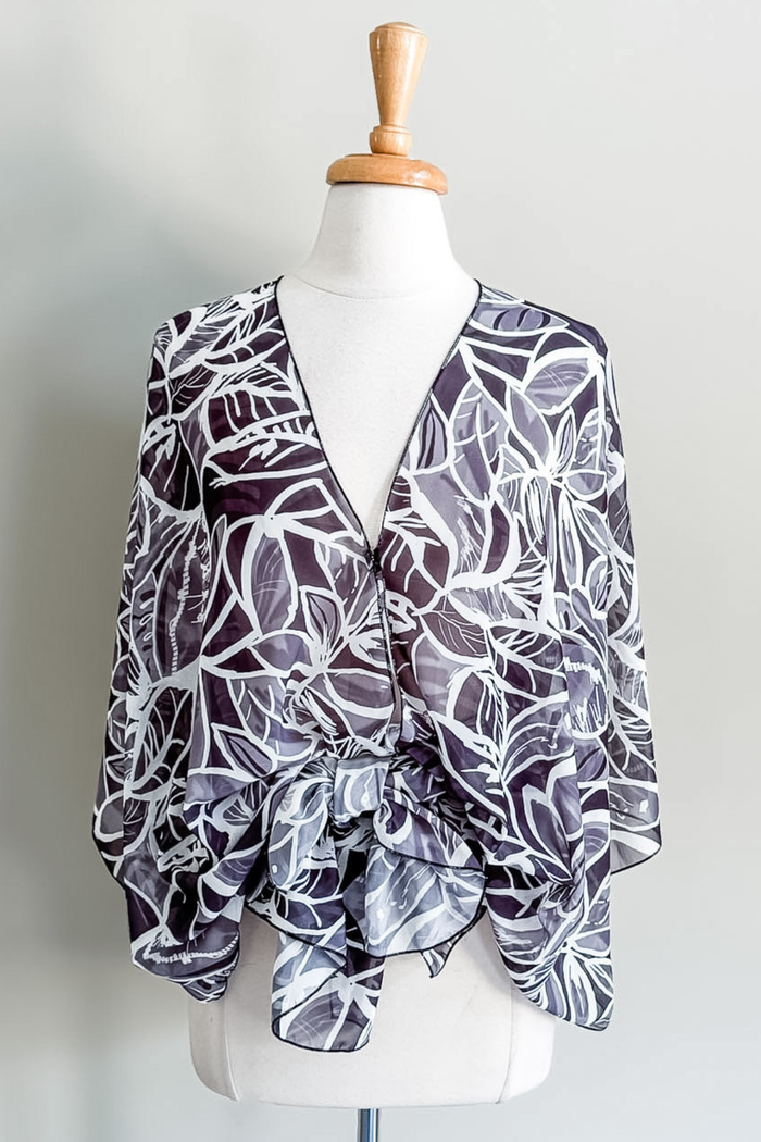 Diane Kroe Butterfly Wrap in Shadow Palm print styled as a versatile wrap top for travel and resort wear