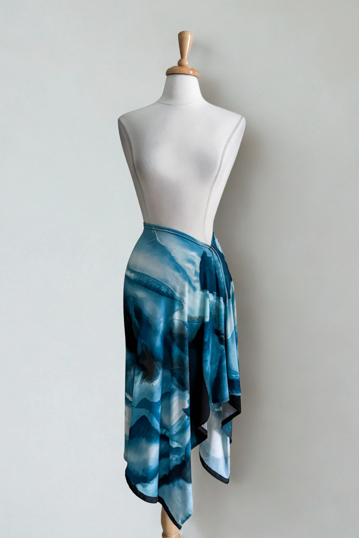 Sea Oasis print Carry-on Cozy worn as a skirt on a mannequin against a plain background