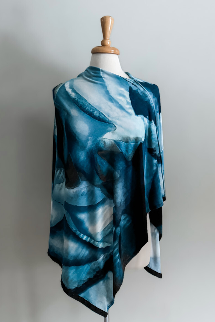 Sea Oasis print Carry-on Cozy worn as a top on a mannequin against a plain background
