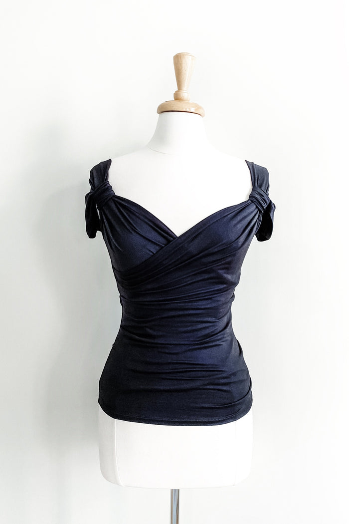 Diane Kroe black Cross Top with a flattering multi-way crossover design.