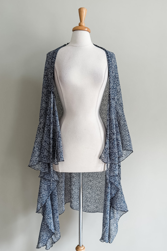 Diane Kroe Blue Tile print Frill Wrap styled as a long cardigan