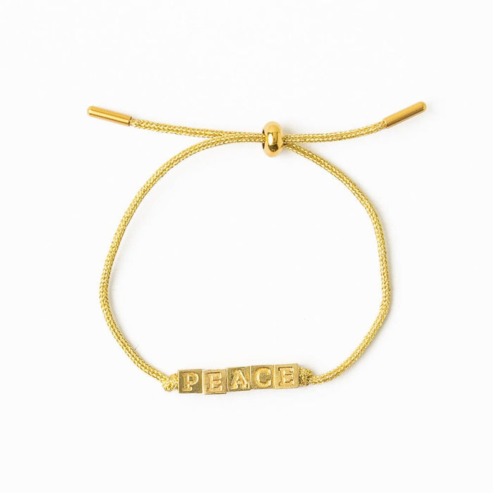 Goldie Gold Lurex Cord With Brass Letters Adjustable Peace Bracelet