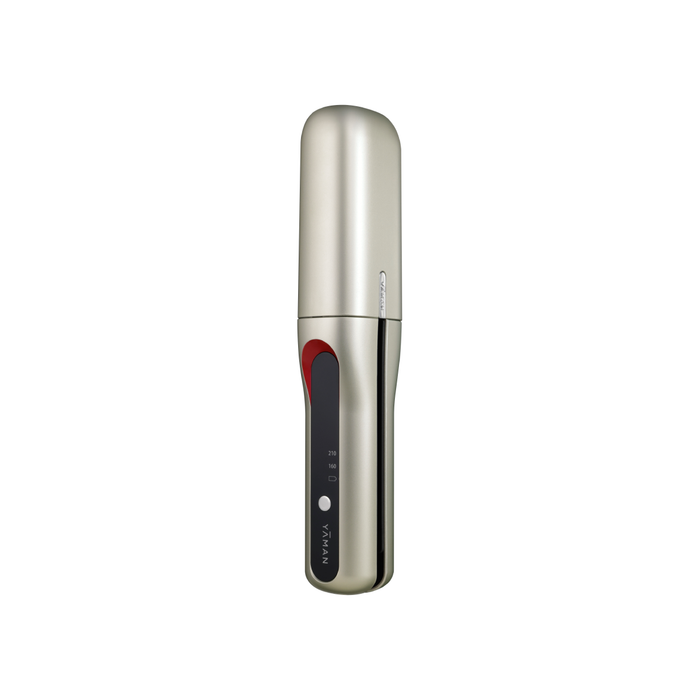 Metallic hair straightener on a white background