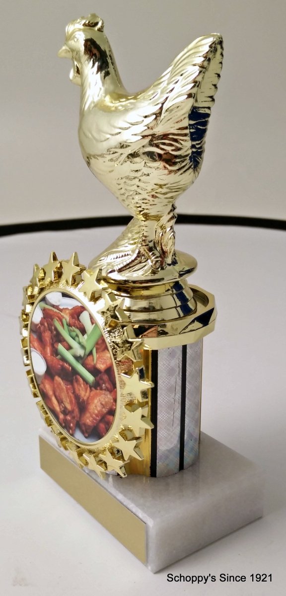 Hot Wings Logo trophy on star logo holder, with a chicken trophy figure atop a gold and white column on a white marble base with a gold engraving plate.