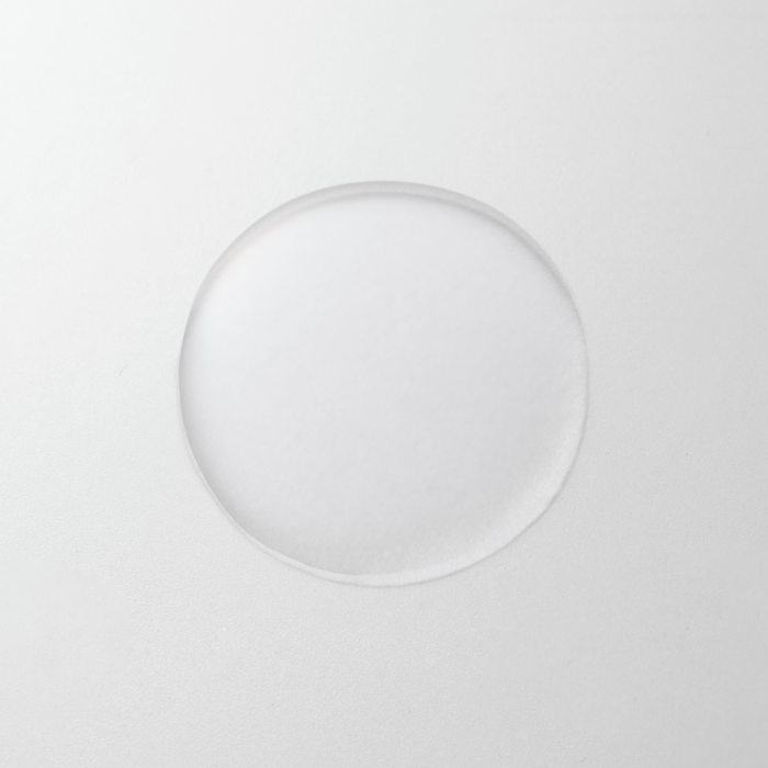 Clear glass plate on a light gray background