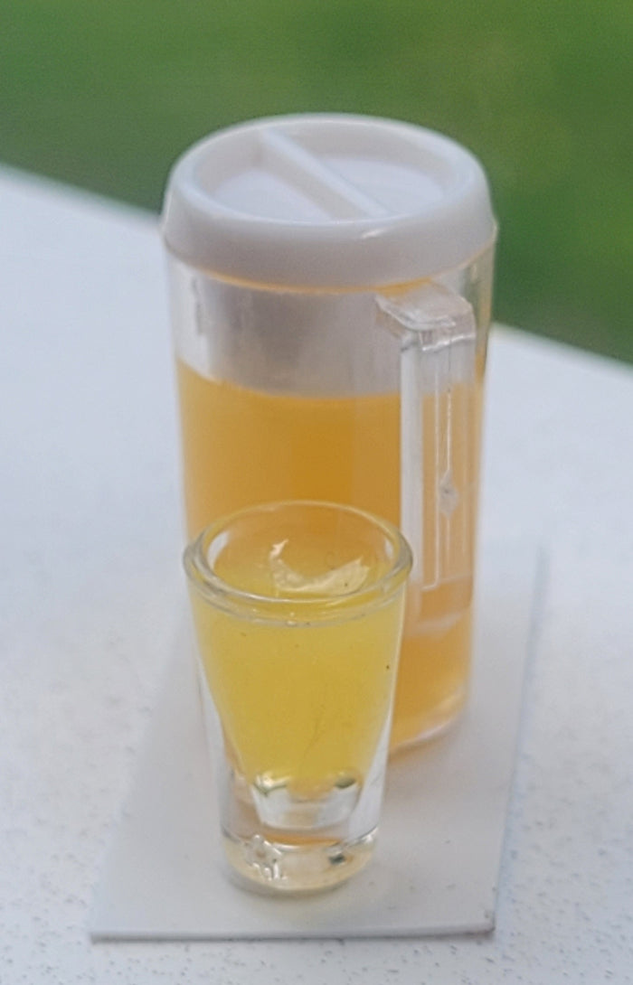 Orange Juice in Pitcher with 2 Glasses