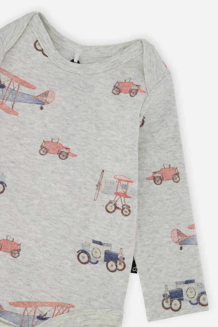 Close-up detail of the Deux par Deux organic cotton onesie with beige vintage airplane print, view 5