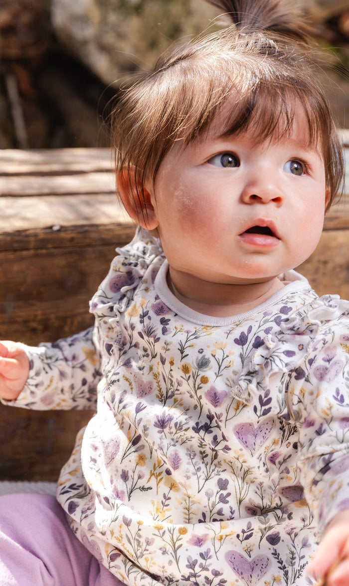 Deux par Deux baby girls ruffle top and leggings set, beige heart print, lifestyle view