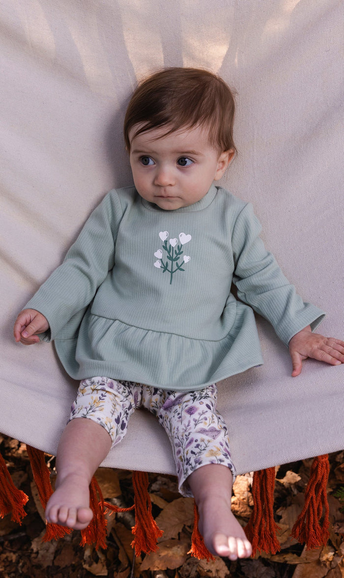 Deux par Deux baby girl green and beige peplum tunic and heart print legging set, styled view 1
