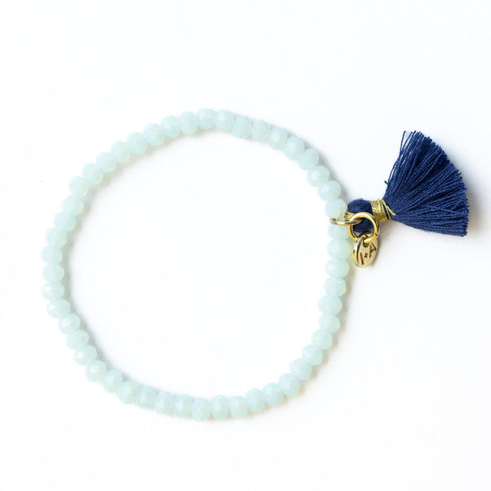 Patsy Solid Crystal Stretch Bracelet With Tassel Light Blue Stretch