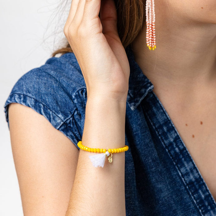 Patsy Solid Crystal Stretch Bracelet With Tassel Yellow Stretch