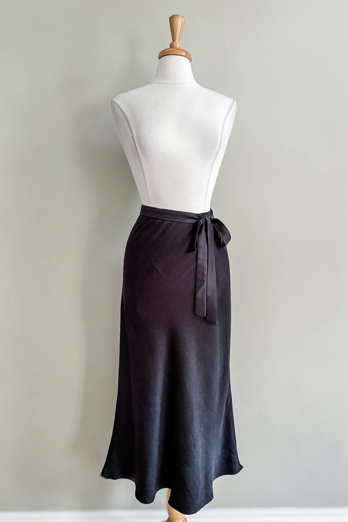Diane Kroe Satin Skirt Dress in black satin styled as an elegant midi skirt