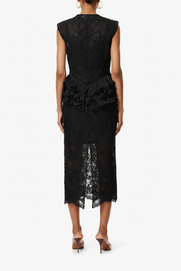 Black lace dress with ruffled details on a white background