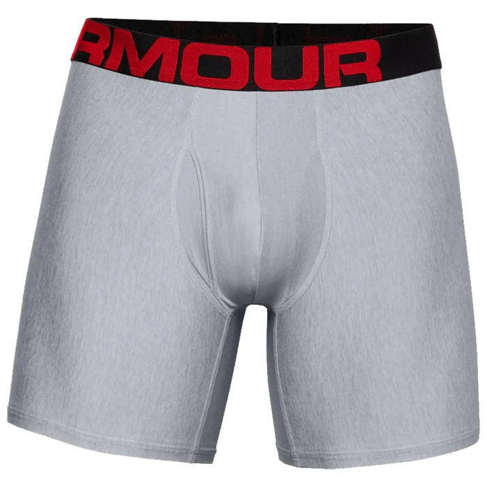 Gray boxer briefs with a black waistband featuring red lettering are displayed prominently. They are made of a smooth fabric, designed for comfort and support during physical activity.