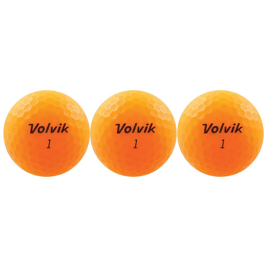Three bright orange golf balls are lined up in a row displaying the brand name Volvik and the number 1 on their surfaces. The background is plain and unobtrusive.