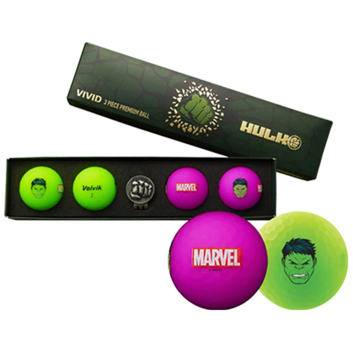 A box contains vibrant golf balls featuring Hulk designs and logos with one green ball displaying an angry Hulk face and another pink ball marked Marvel surrounded by two additional balls and a black fist emblem.